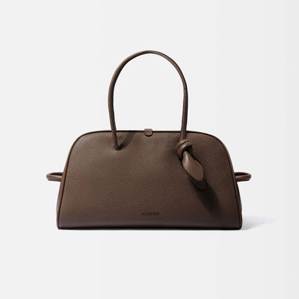 <a href="/tr-tr/collections/jacquemus-the-turismo-canta-modelleri" title="Jacquemus The Turismo Çanta Modelleri">The Turismo</a>