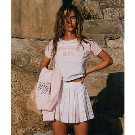 Sporty & Rich Women's Vendome Script Pleated Skirt White/Pink Dolphin