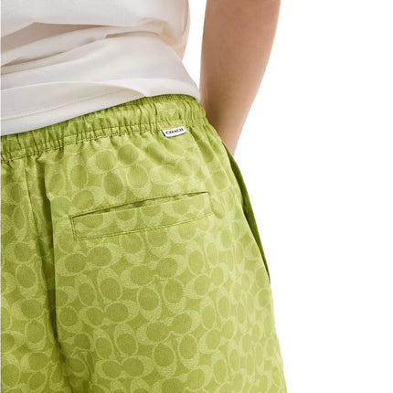 Coach Men's Signature Swim Trunks In Recycled Polyester Pear