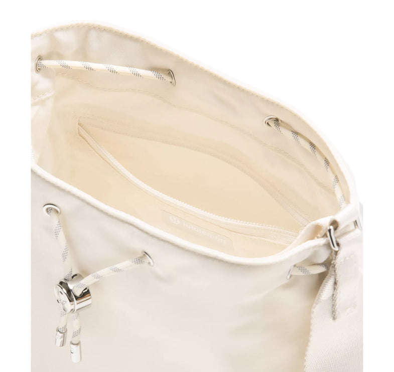 lululemon Unisex Drawstring Bucket Crossbody Bag 5L Light Ivory/Silver