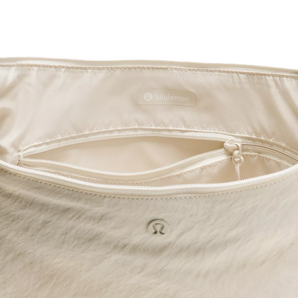 lululemon Unisex Large Slouchy Sling Bag 13L Light Ivory