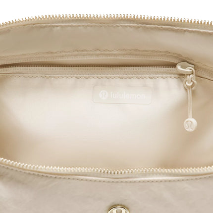 lululemon Unisex Slouchy Sling Bag 6L Metal Hardware Light Ivory/Gold