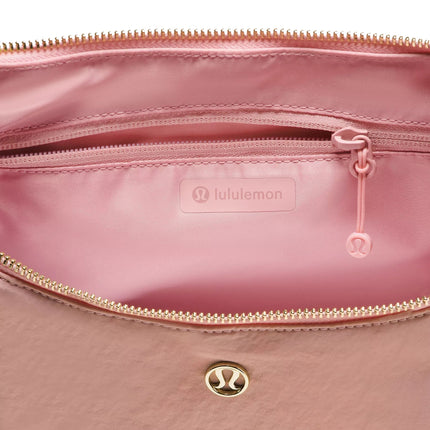 lululemon Unisex Slouchy Sling Bag 6L Metal Hardware Pink Haze/Gold
