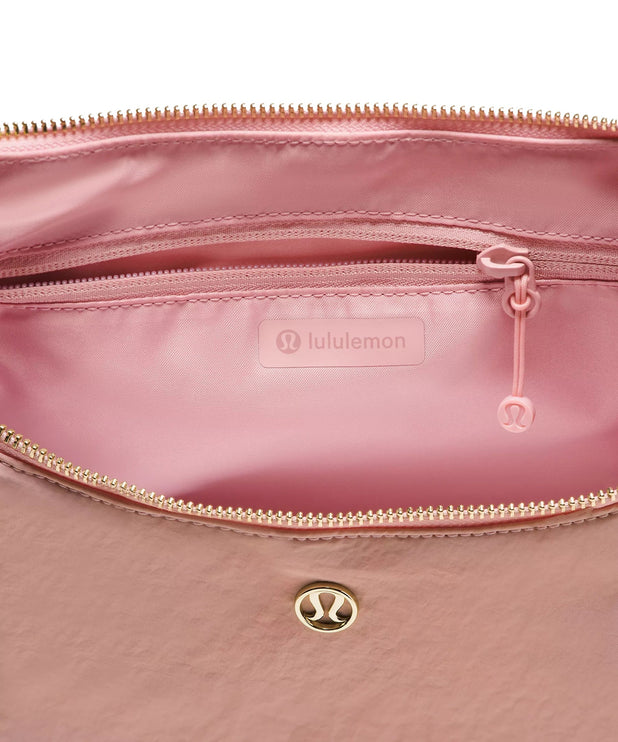 lululemon Unisex Slouchy Sling Bag 6L Metal Hardware Pink Haze/Gold