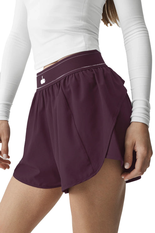 alo Women's Match Point Short Rich Bordeaux