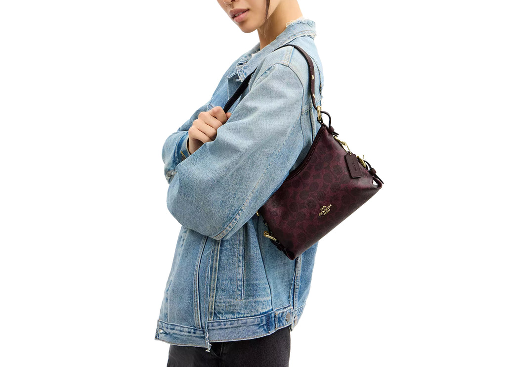 Coach Women's Laurel Shoulder Bag 22 With Buckles In Signature Canvas Gold/Black Currant